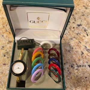 Gucci watch w gold band